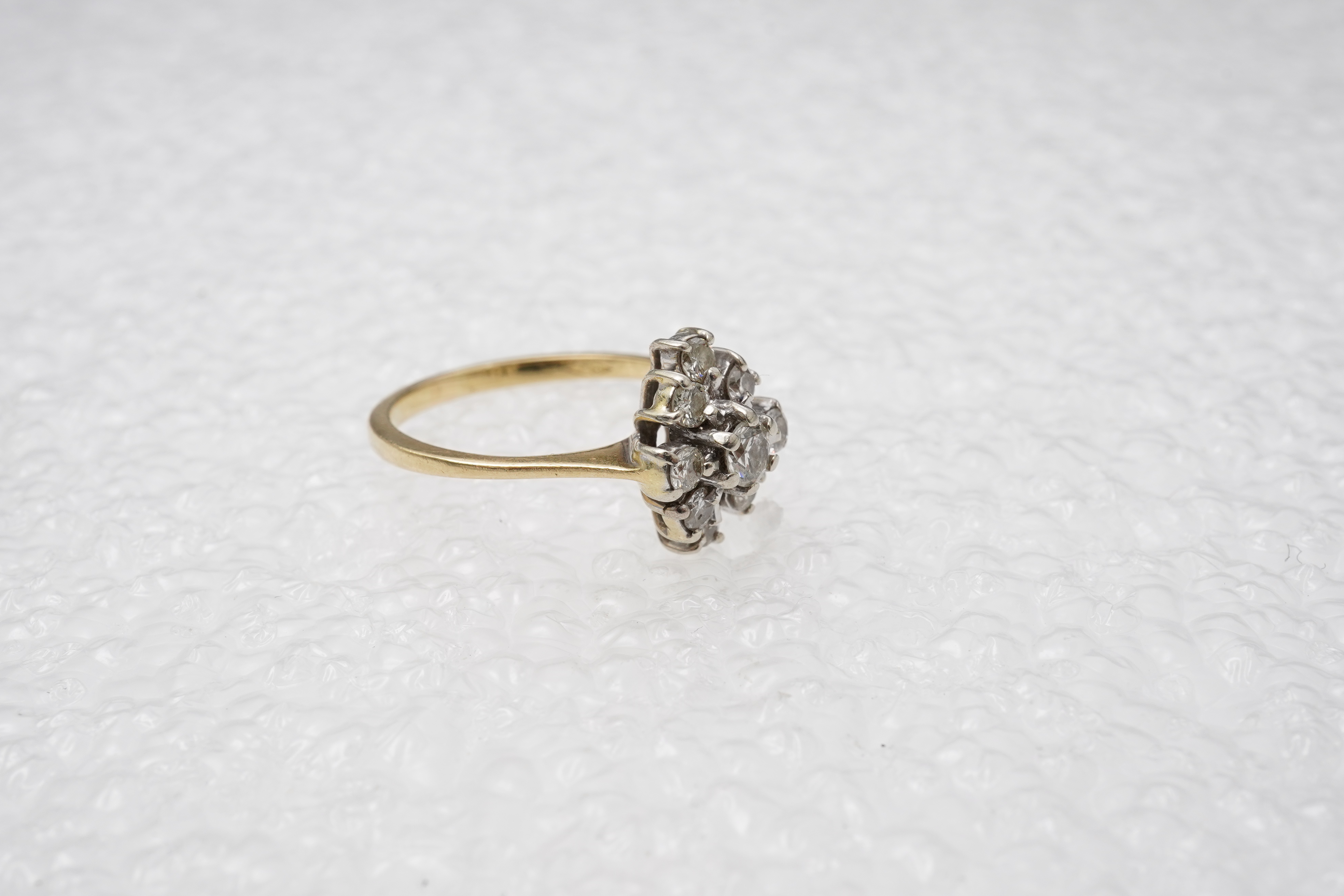 A diamond cluster ring